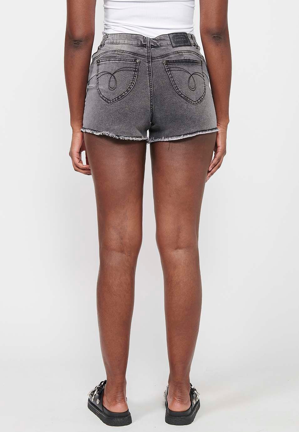 Short, fermeture avant avec fermeture éclair et bouton, couleur denim noir pour femme