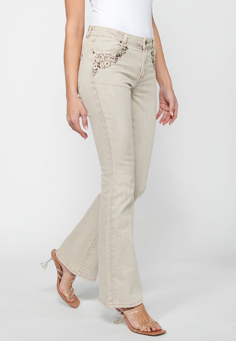Long bell bottom pants with front zipper closure in Beige for Women 1