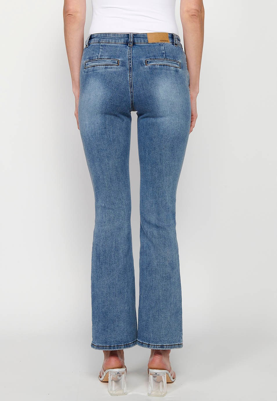 Pantalons llargs acabats en campana i costura davantera amb Tancament davanter amb cremallera i botó color Blau per a Dona