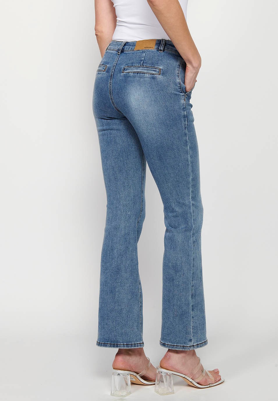 Pantalons llargs acabats en campana i costura davantera amb Tancament davanter amb cremallera i botó color Blau per a Dona