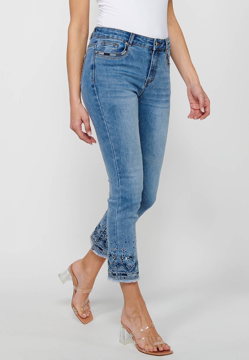 Long denim pants with embroidered details with front closure with zipper and button in Blue for Women 5
