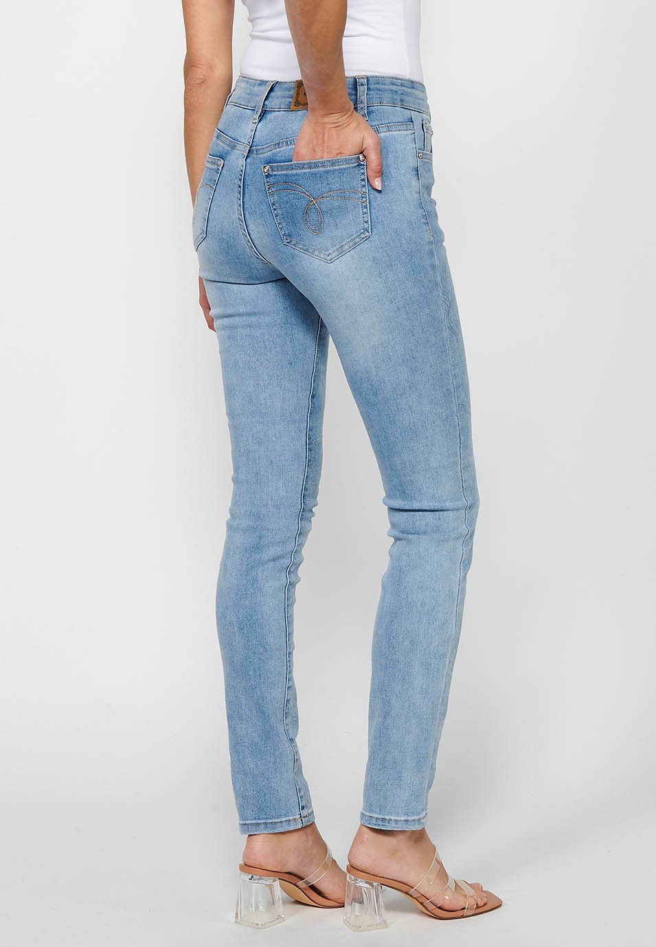 Long slim denim pants with floral details and front closure with zipper and button in Light Blue for Women 6