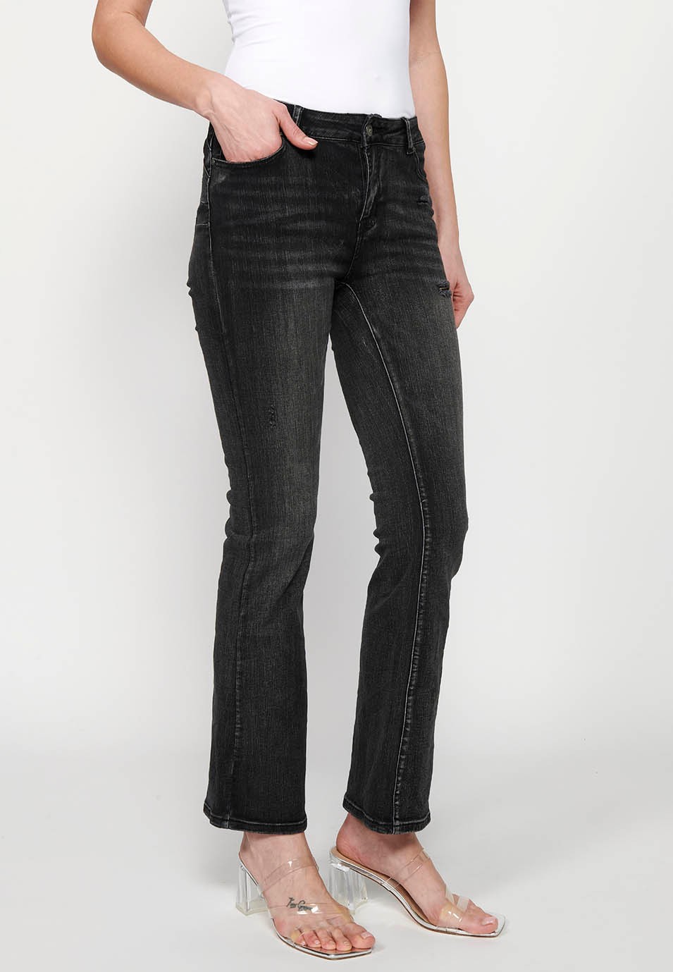 Long bell bottom pants with broken details in black for women