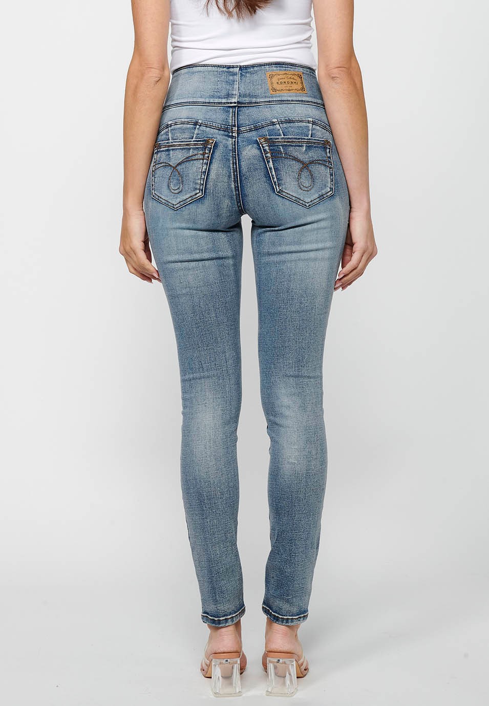 Pantalons llargs slim amb Cintura ampla de Tancament davanter amb cremallera i botó de Color Blau per a Dona 1