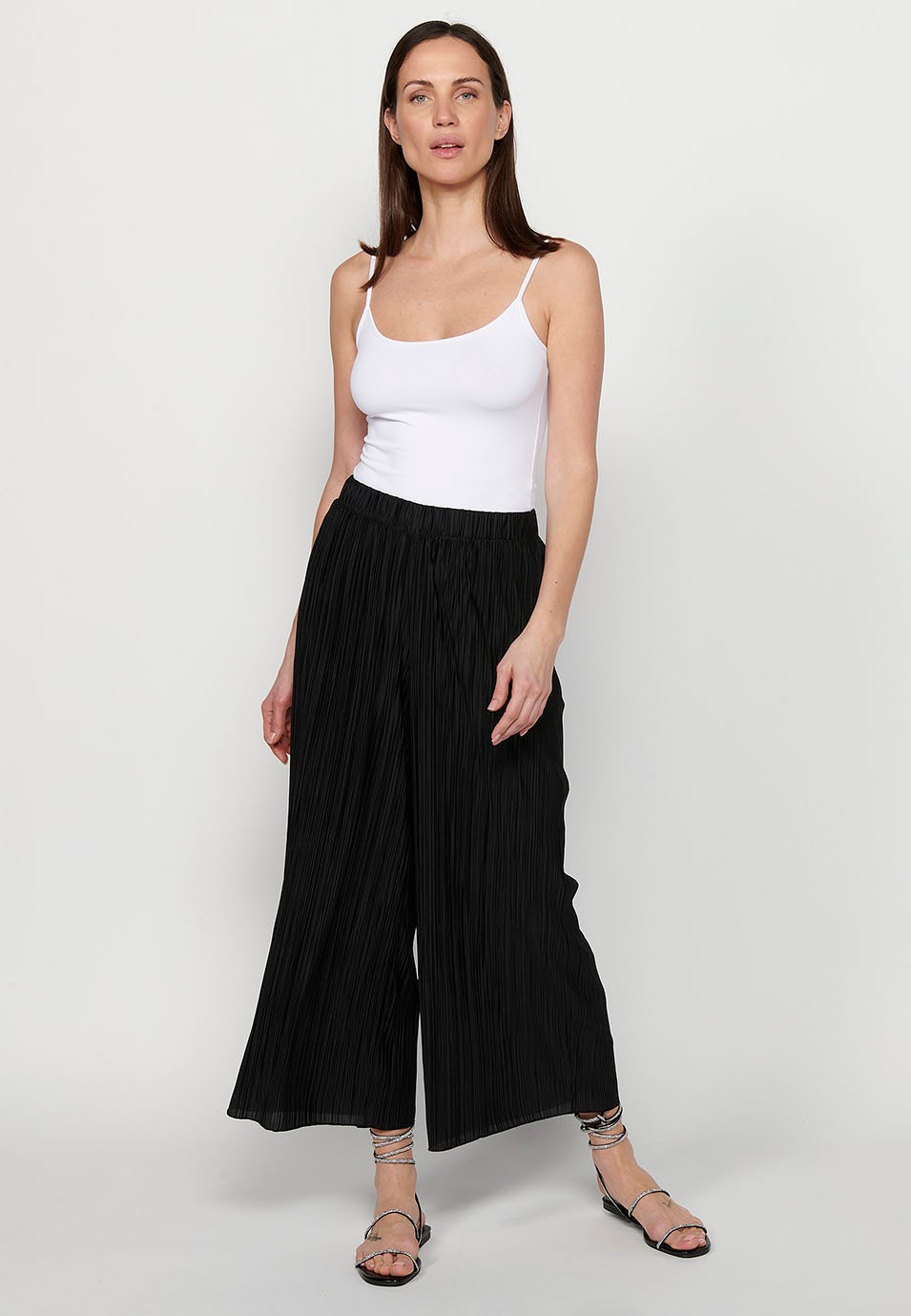 Pantalon long léger, taille caoutchoutée, tissu plissé noir pour femme