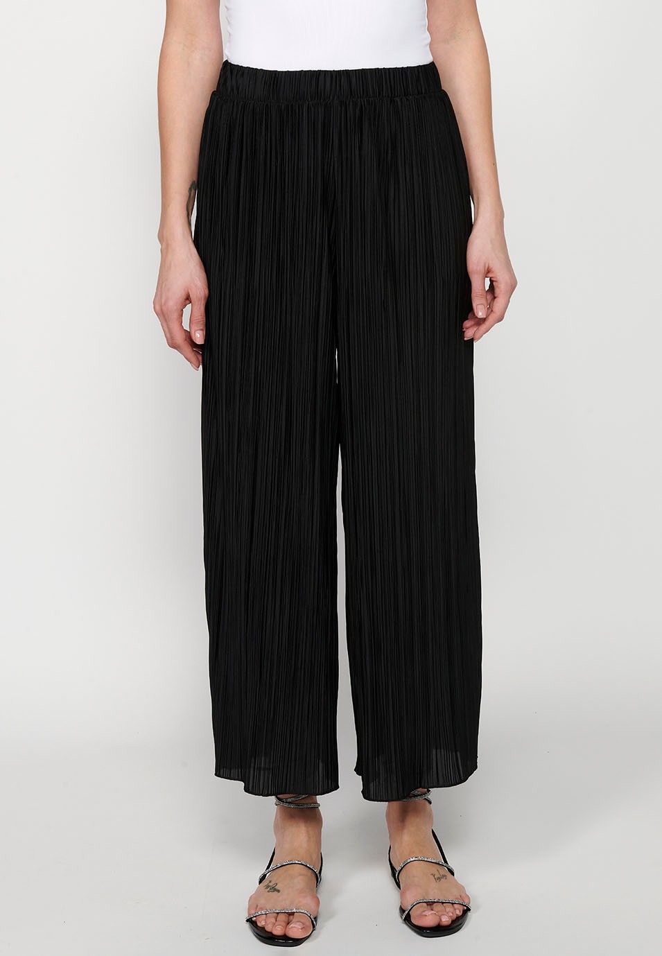 Pantalon long léger, taille caoutchoutée, tissu plissé noir pour femme