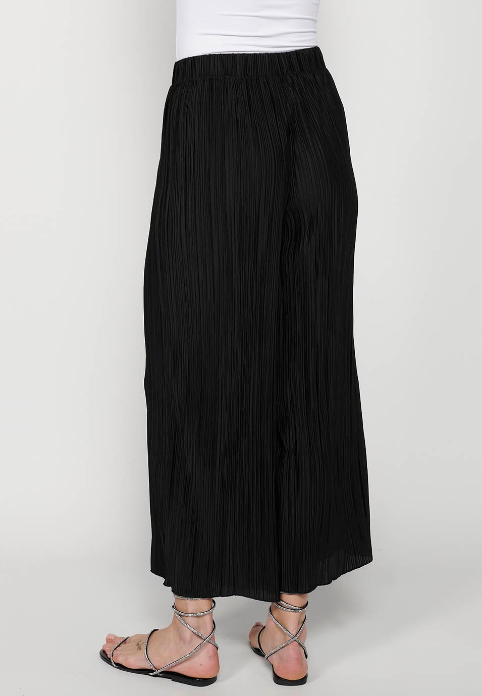 Leichte lange Hose, gummierter Bund, schwarzer Faltenstoff für Damen