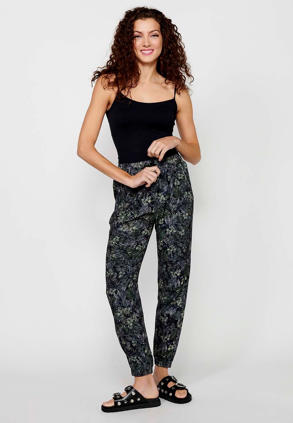 Long jogging pants fitted at the ankles with elasticated waistband with drawstring and Khaki floral print for Women