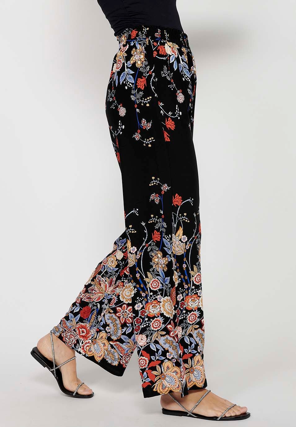 Pantalon long ample à imprimé floral et taille caoutchoutée en noir pour femme 1