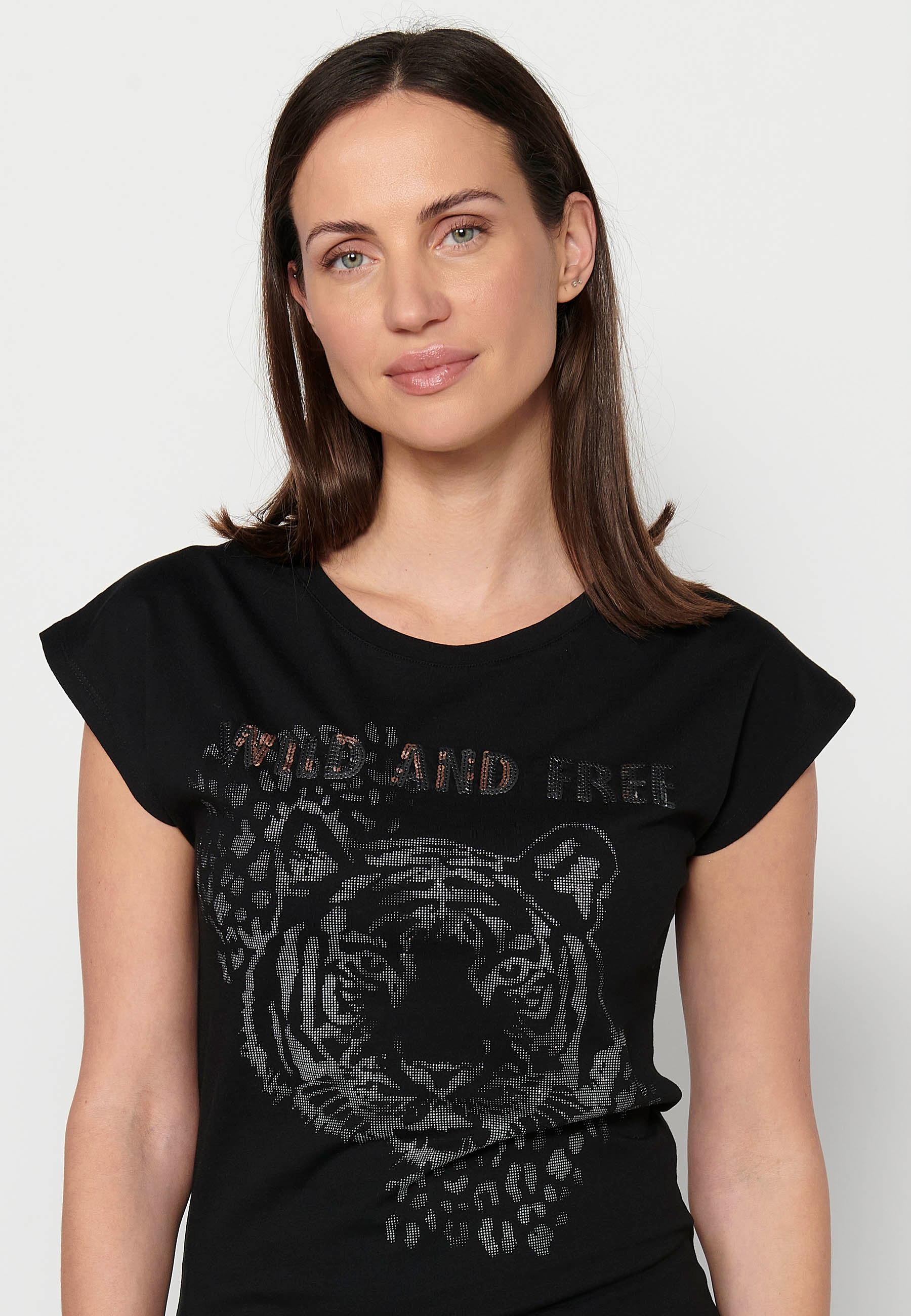 T-shirt manches courtes col rond en coton imprimé devant en Noir pour Femme
