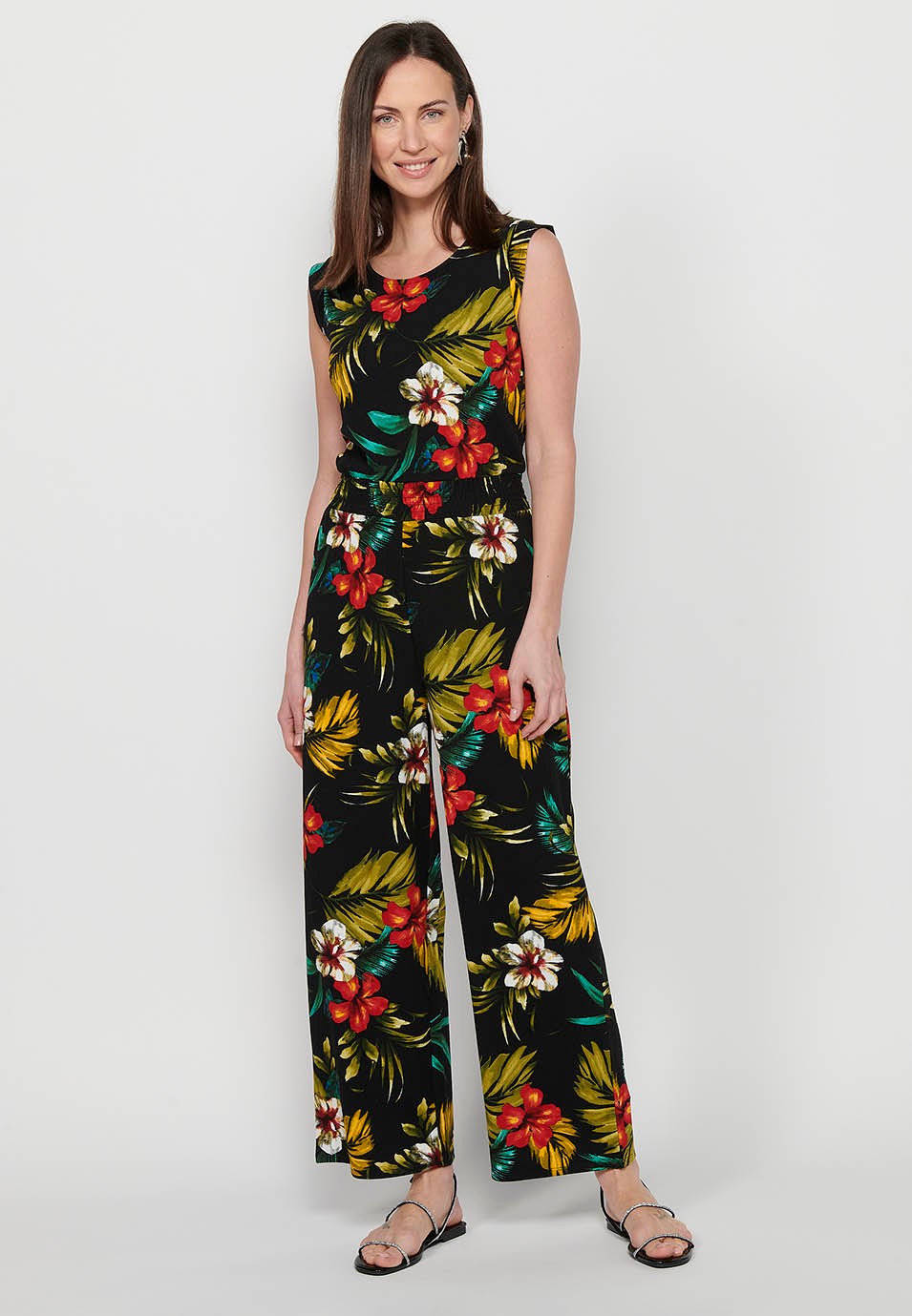 Jumpsuit dress with zipper back closure and tropical floral print, round neck and tight waist with elastic band in Multicolor for Women