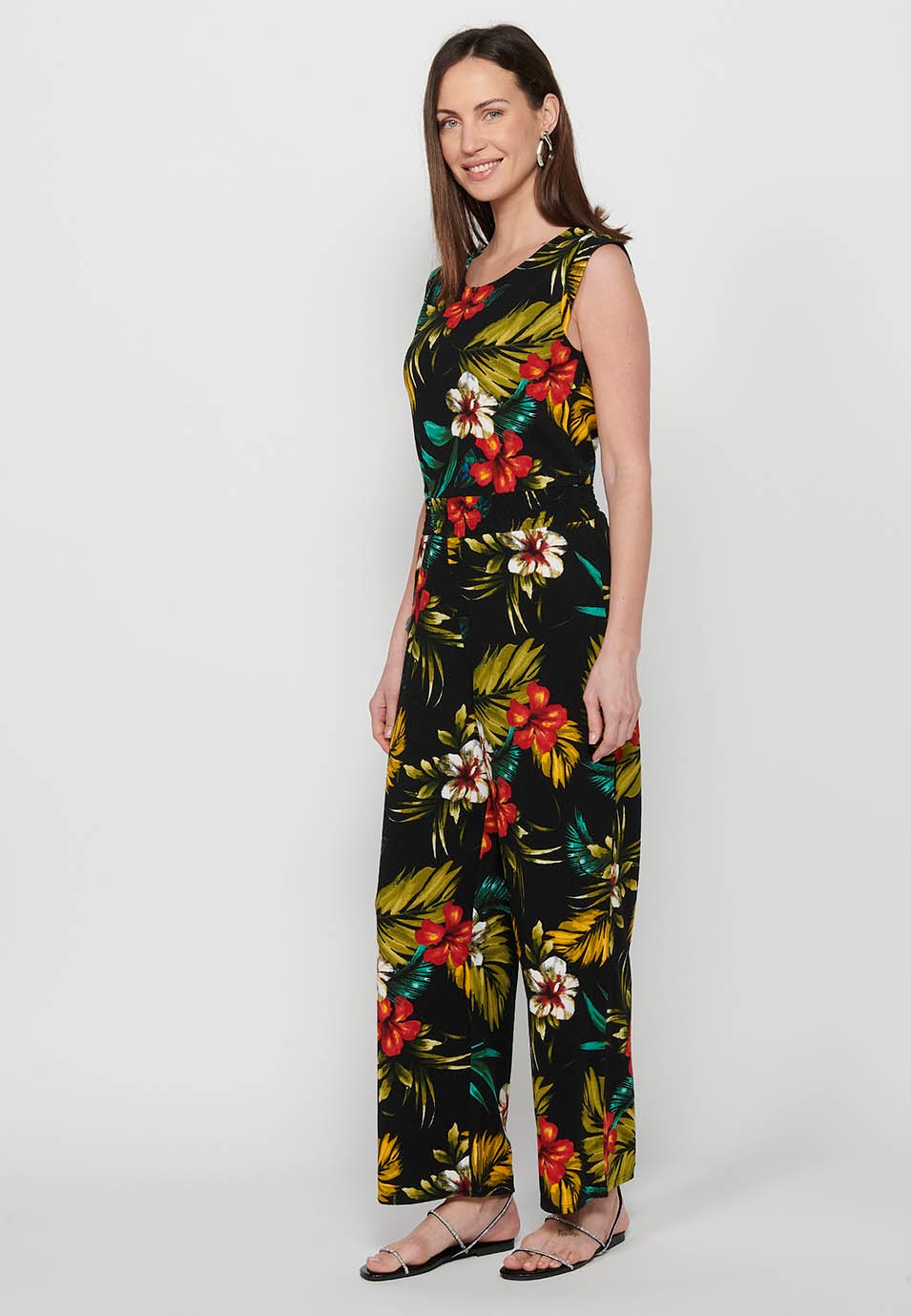 Jumpsuit dress with zipper back closure and tropical floral print, round neck and tight waist with elastic band in Multicolor for Women