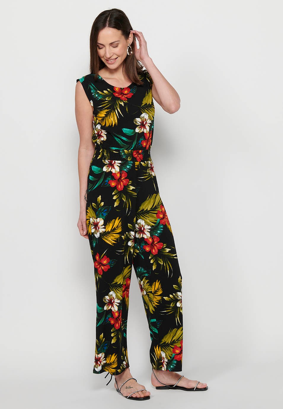 Jumpsuit dress with zipper back closure and tropical floral print, round neck and tight waist with elastic band in Multicolor for Women