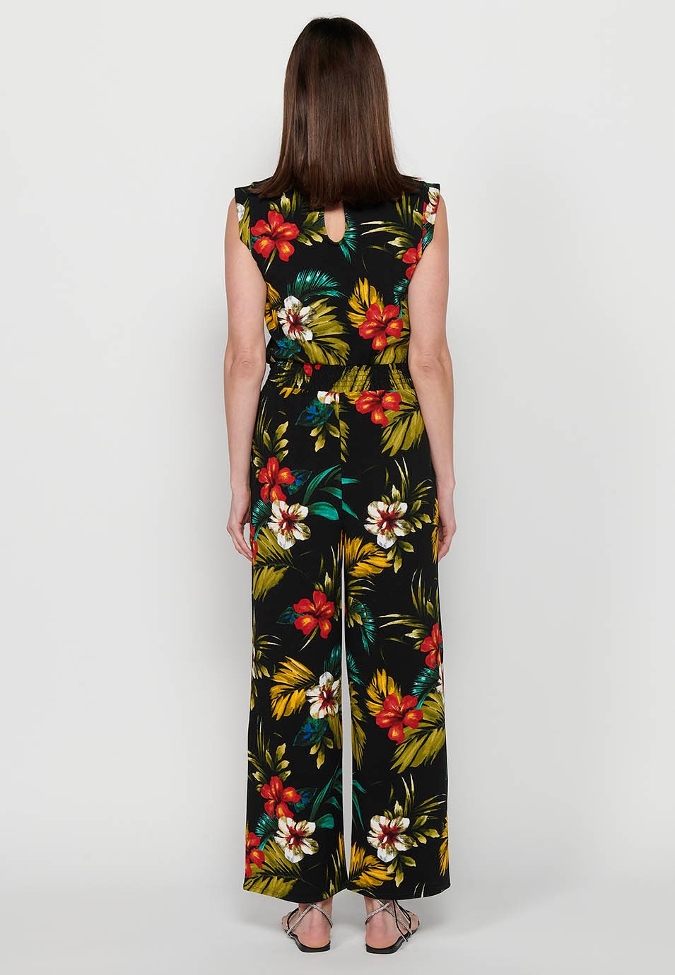 Jumpsuit dress with zipper back closure and tropical floral print, round neck and tight waist with elastic band in Multicolor for Women