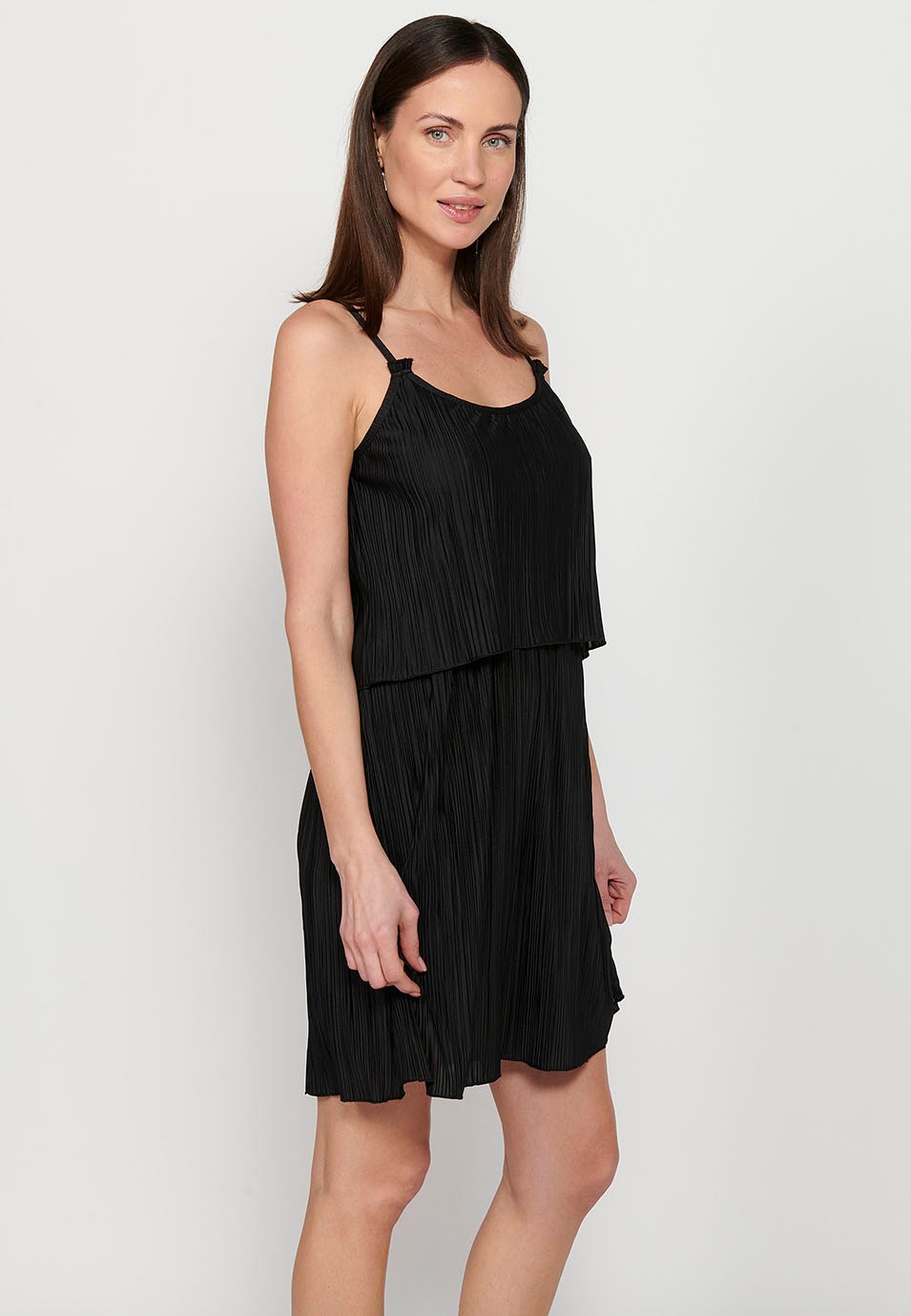 Short strap dress with pleated fabric and rubberized waist cut in a black layer for Women 1