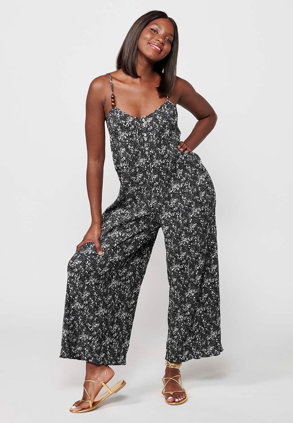 Loose jumpsuit with floral print in black for women