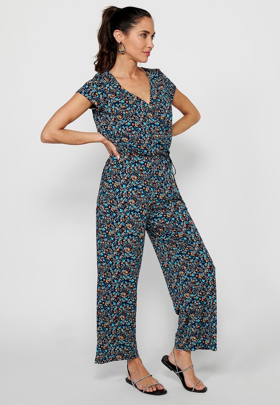 Short-sleeved jumpsuit with crossed V-neckline and tight waist with elastic band in Multicolor for Women 1