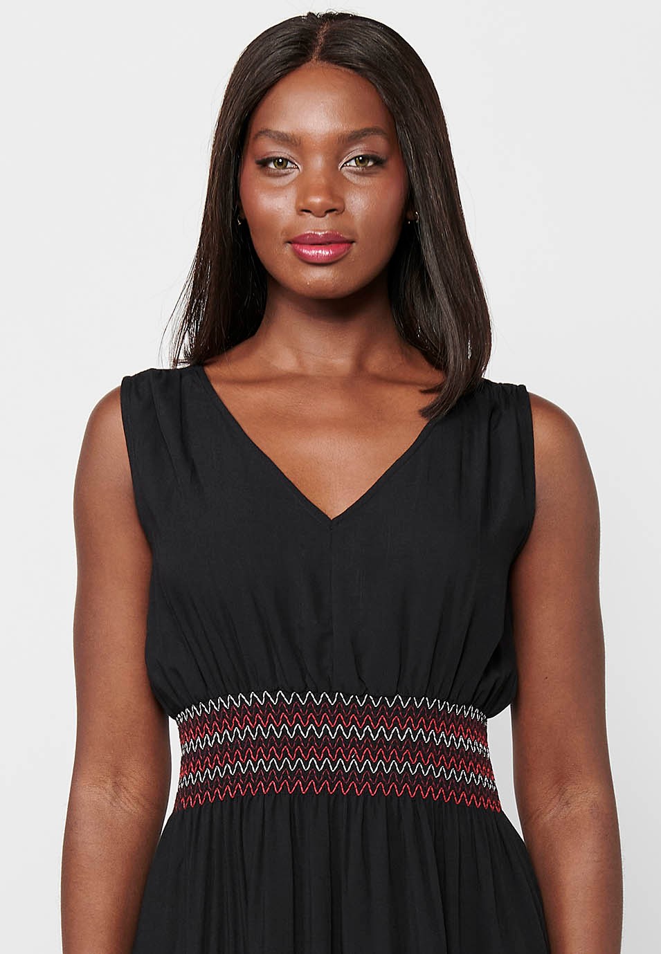 Vestido largo sin mangas, escote de pico cintura engomada color negro para mujer | Moda Actual