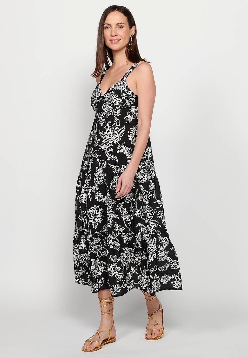 Long dress with wide straps with ruffle finish and V-neckline with floral print in Black for Women