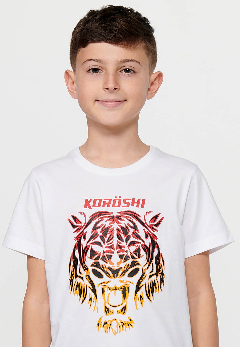 Short-sleeved cotton T-shirt with a round neckline. White front print for Boys