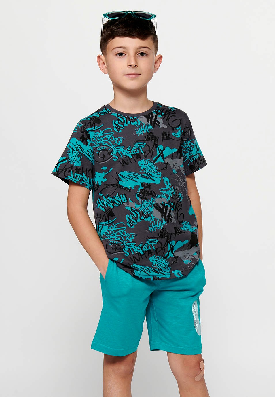 Pack de camiseta y pantalón corto la Camiseta de manga corta y estampada y el Pantalón corto con cintura engomada de Color Menta para Niño