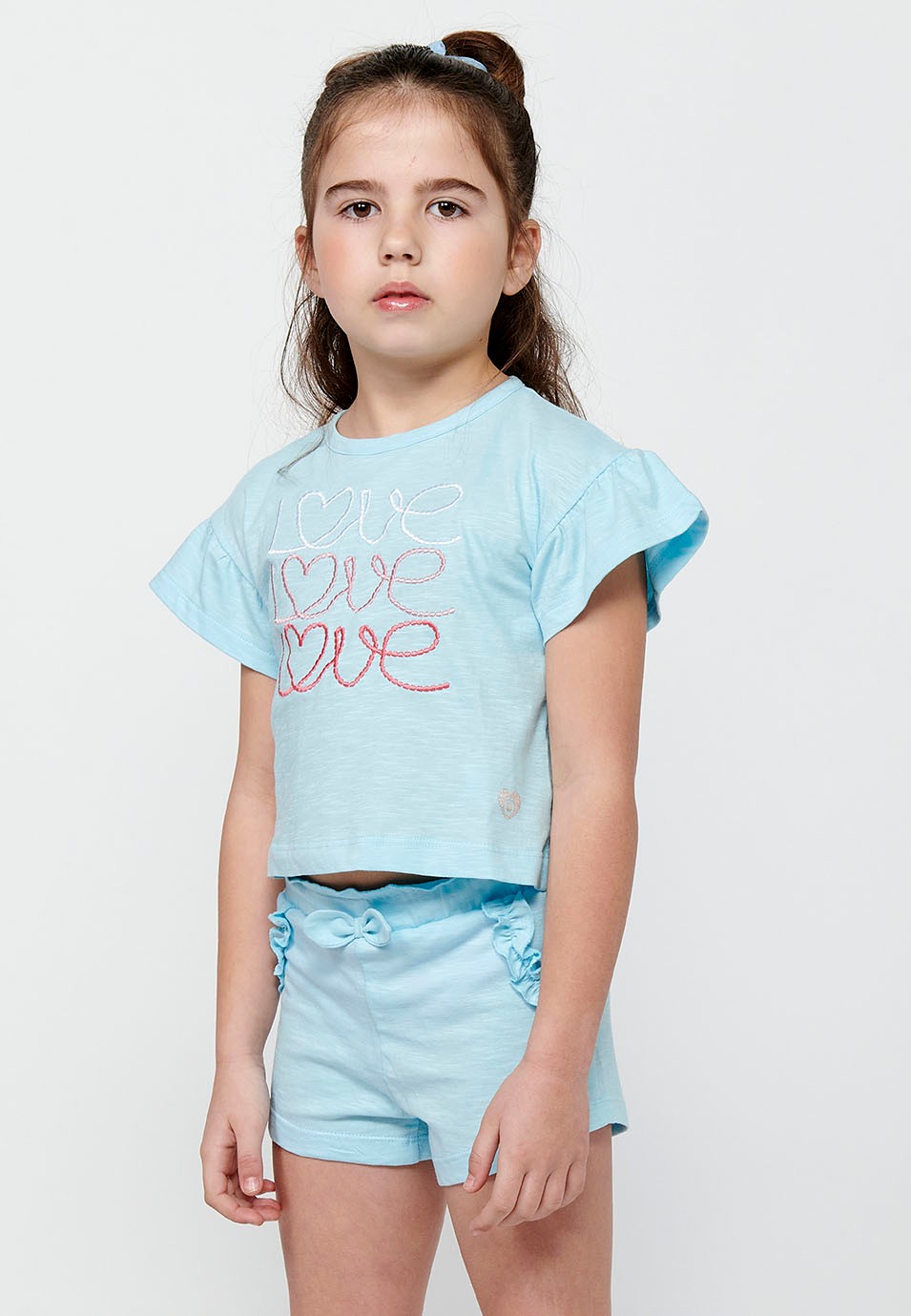Conjunt de samarreta i pantalons. Samarreta de màniga curta amb estampat davanter i Pantalons curts amb cintura engomada de Color Blau per a Nena 5