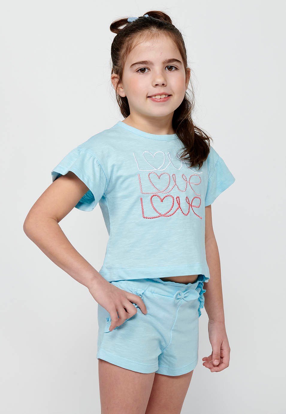 Conjunto de camiseta y pantalón. Camiseta de manga corta con estampado delantero y Pantalón corto con cintura engomada de Color Azul para Niña 6