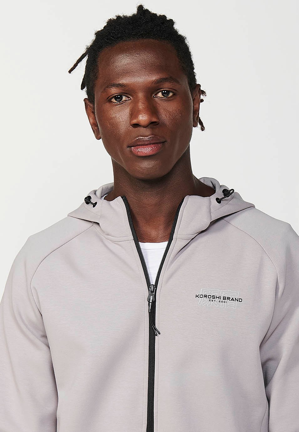 Chaqueta de manga larga con cuello y capucha con cierre delantero y cremallera con bolsillos para hombre de color gris