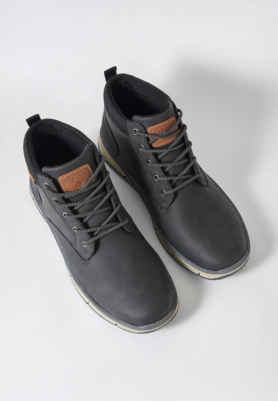 Zapatillas botín para hombre en color negro 7