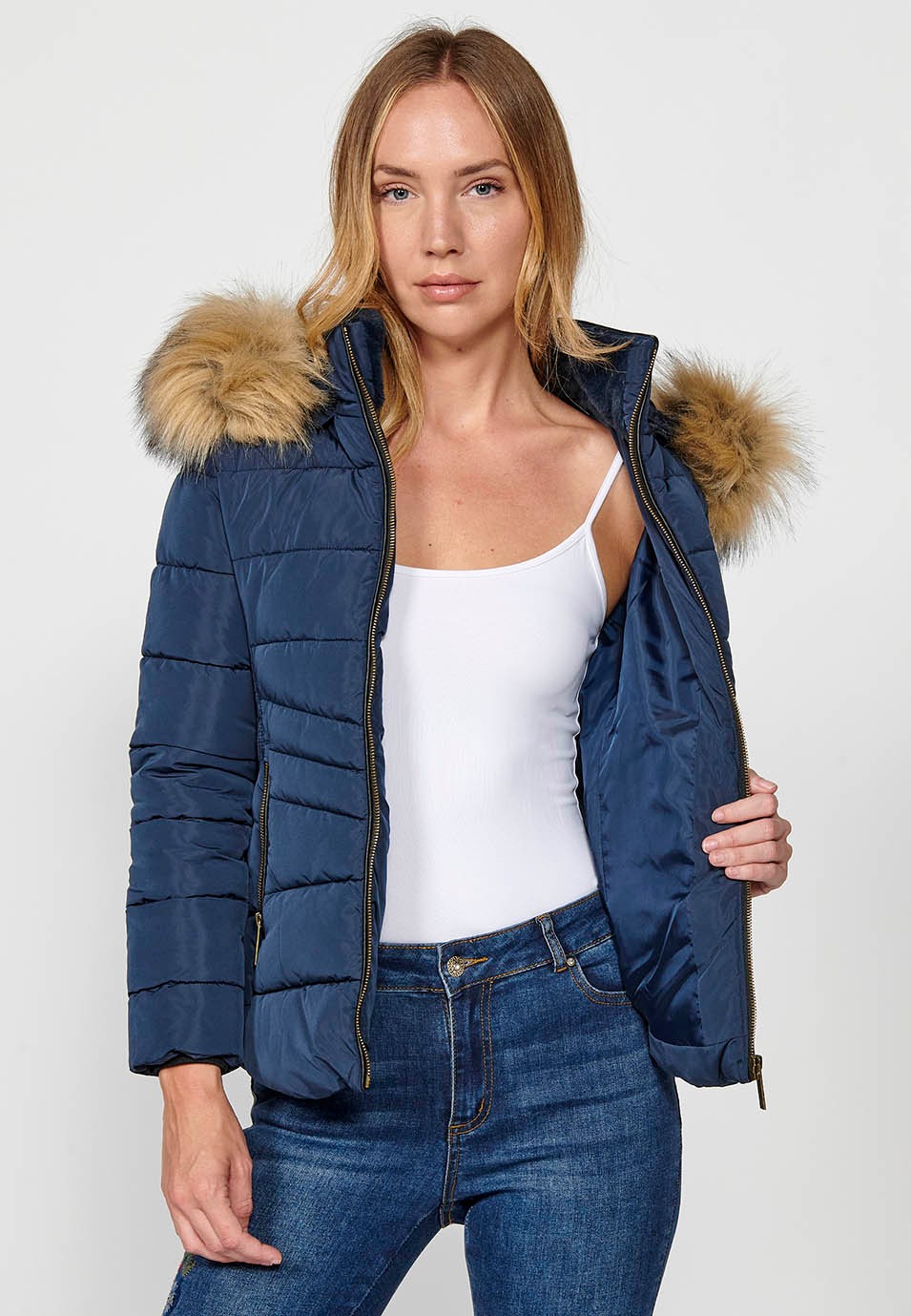 Chaqueta acolchada con cuello y capucha de pelo sintético con cierre delantero y cremallera para mujer de color navy