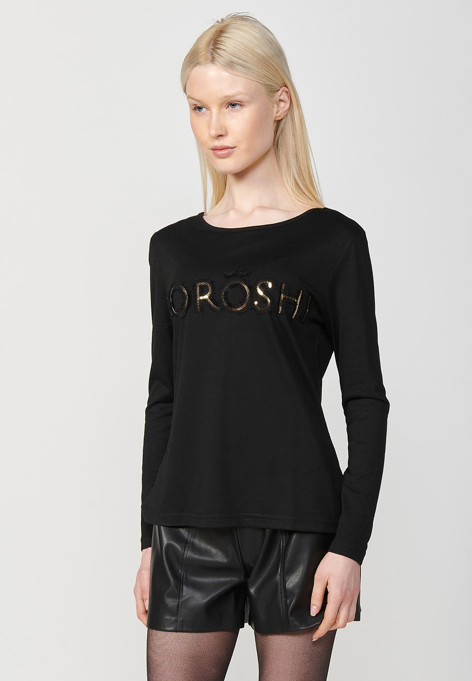 Koröshi Glitter Letter Print Long Sleeve Crew Neck T-Shirt in Black for Women