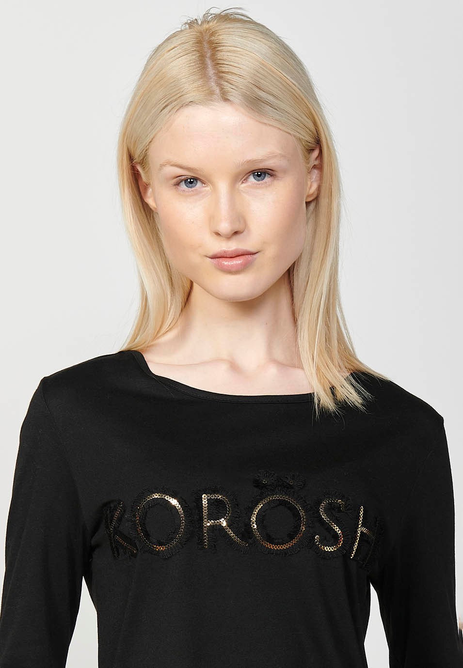 Koröshi Glitter Letter Print Long Sleeve Crew Neck T-Shirt in Black for Women