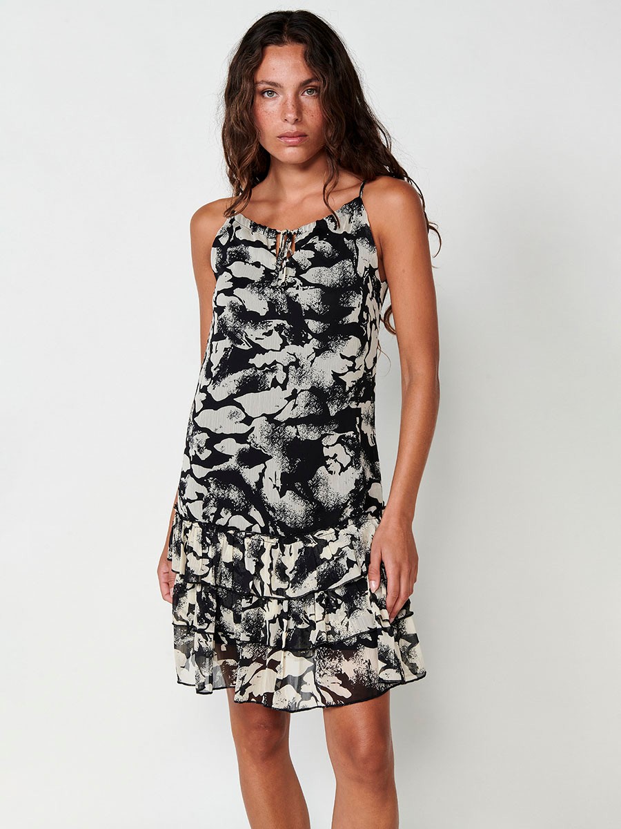 Vestido Corto Fluido Semitransparente con Forro Ligero, Escote Halter con Lazo y Estampado Abstracto en Negro