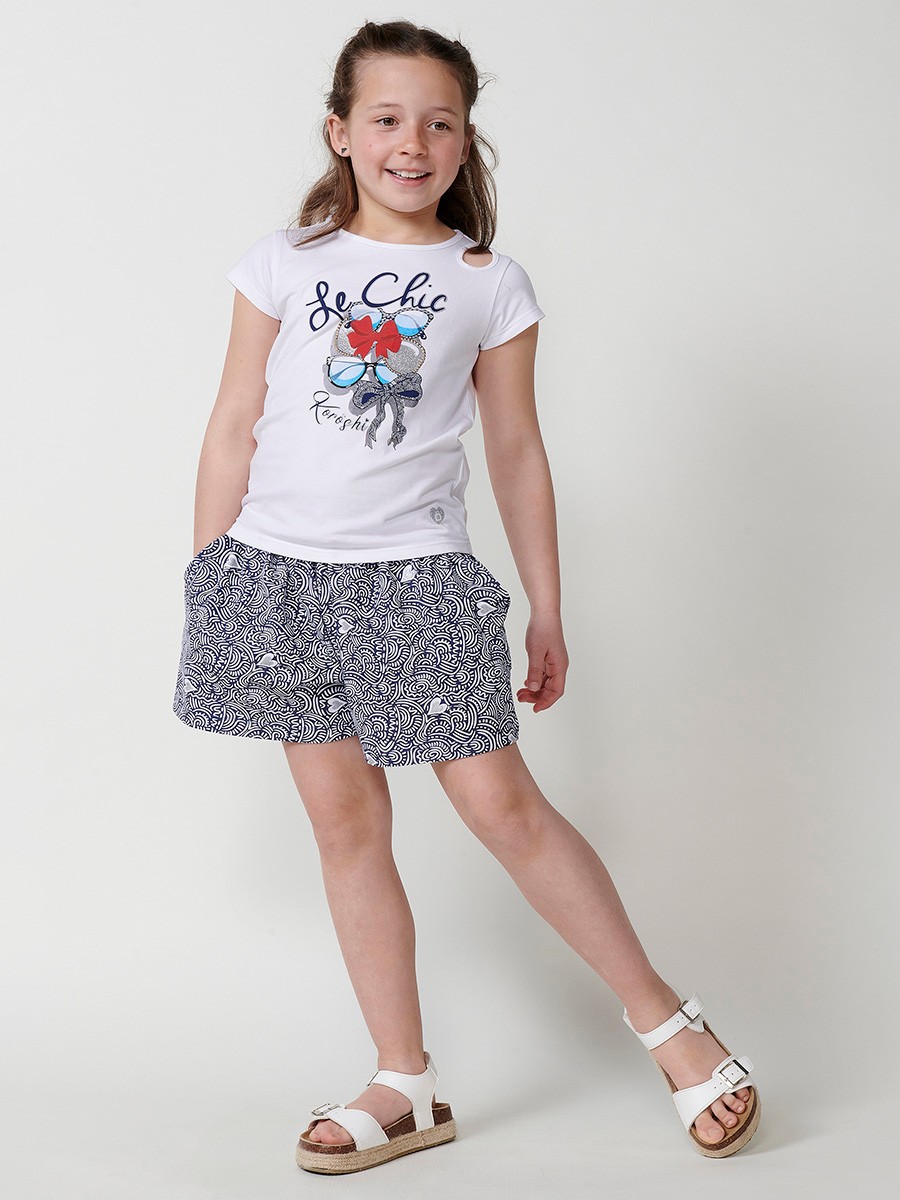 Top blanco de niña con estampado de gafas brillantes y detalle lágrima en el hombro