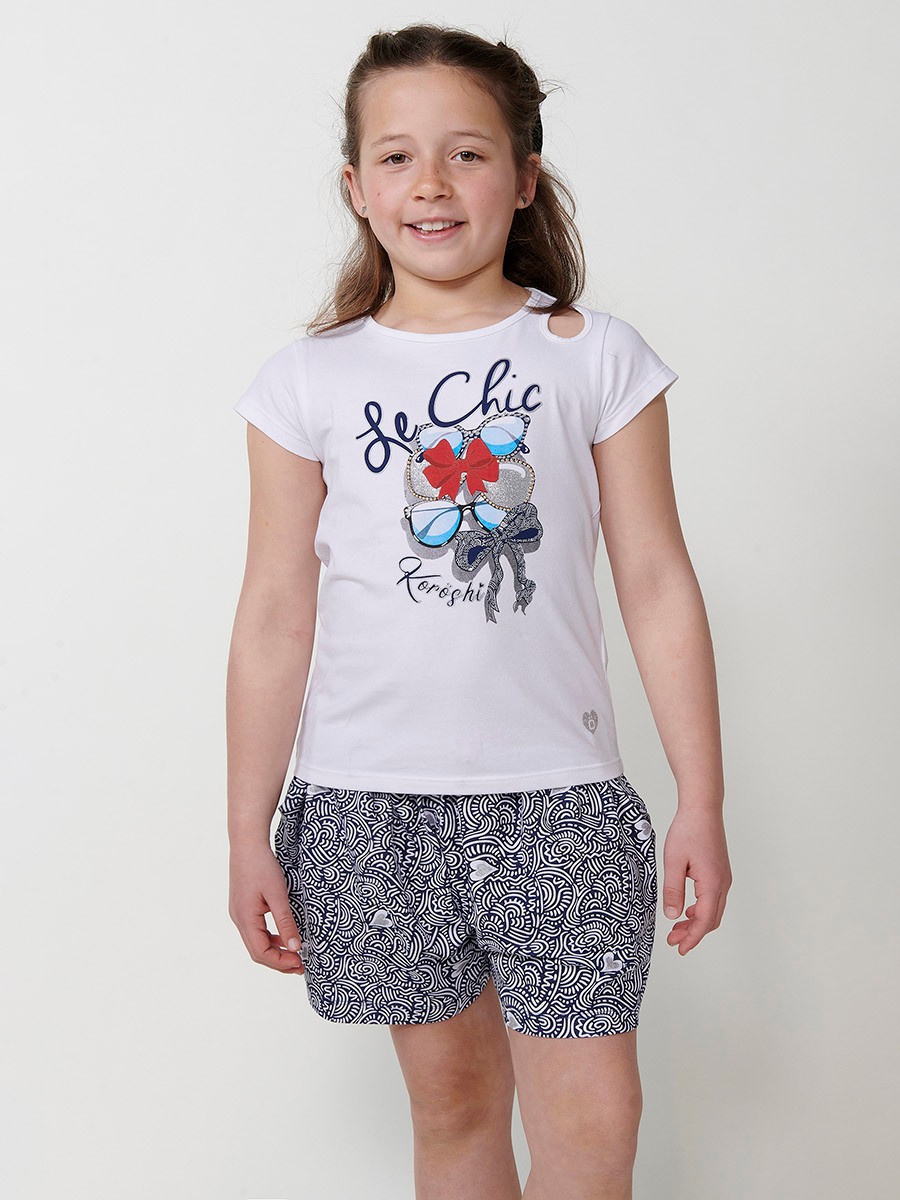 Top blanco de niña con estampado de gafas brillantes y detalle lágrima en el hombro