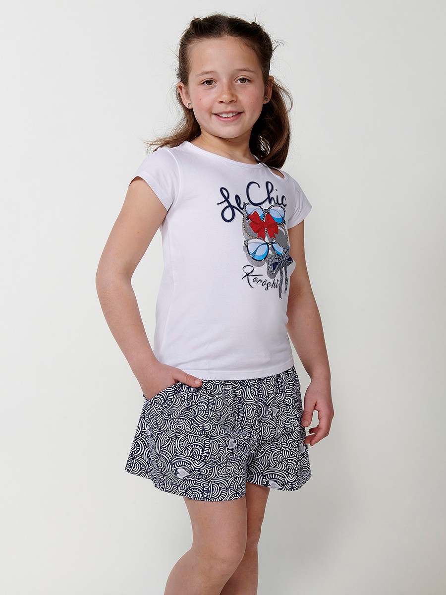 Top blanco de niña con estampado de gafas brillantes y detalle lágrima en el hombro