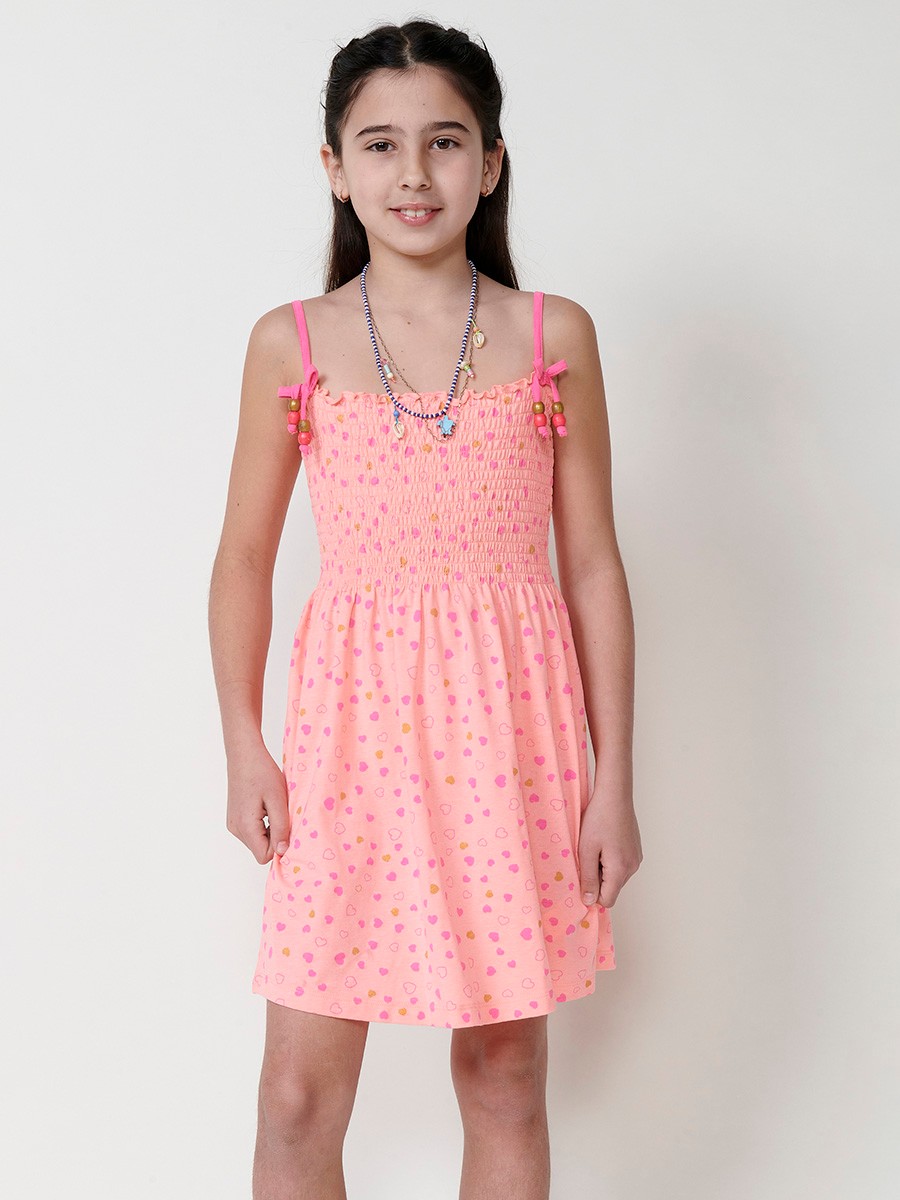 Vestido de niña naranja con estampado fucsia y dorado, tirantes con lazo y pecho fruncido 6