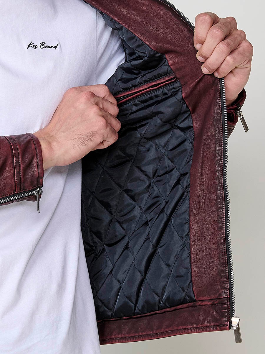 Men’s biker-style jacket in wine color with detachable hood and zip closure. Outer: 100% cotton, coated with polyurethane.