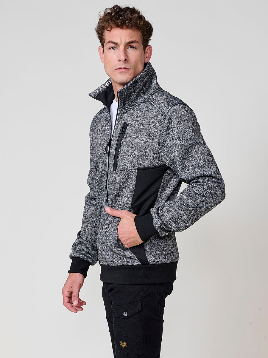 Men’s black hoodie jacket with high neck, hood and zip closure. Made of 100% polyester, comfortable, lightweight and versatile.