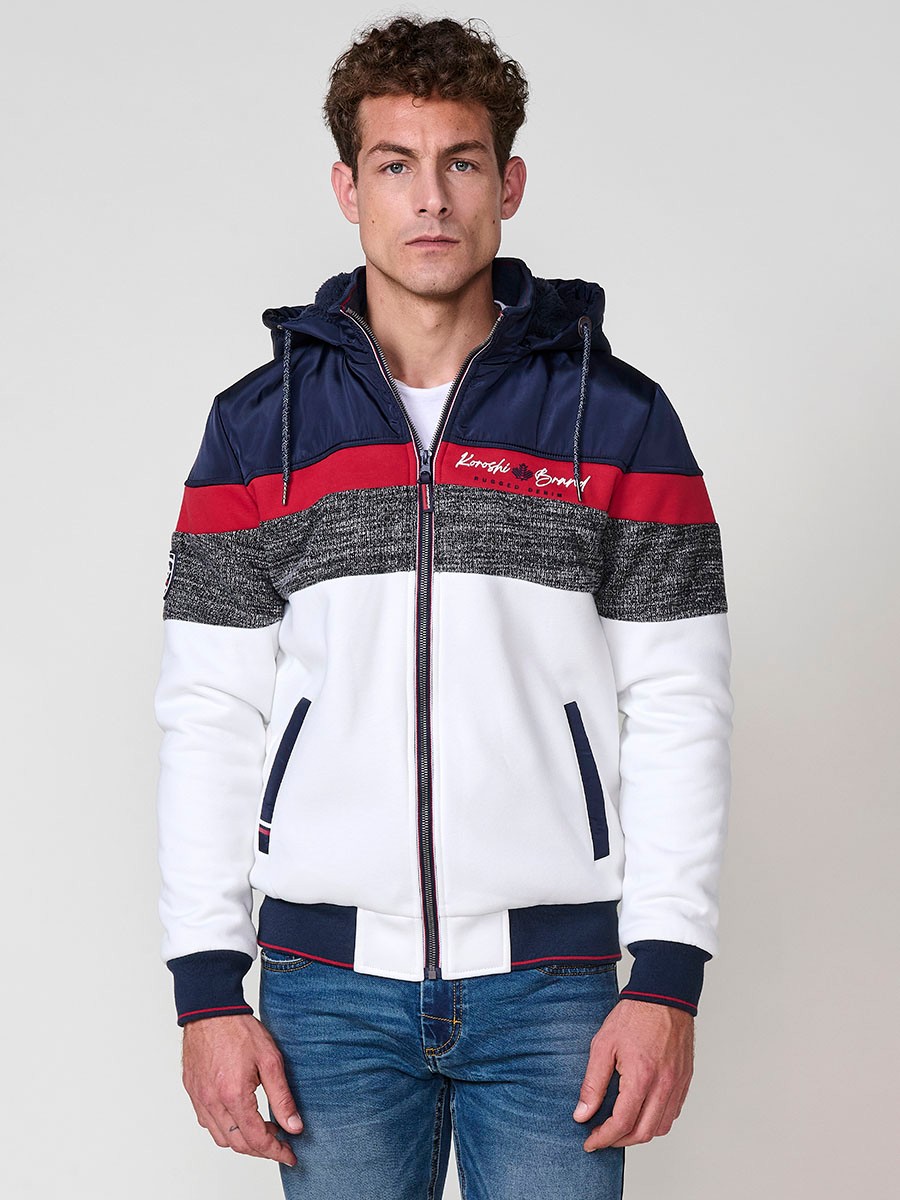 Chaqueta sudadera crudo de hombre con capucha y cierre delantero de cremallera. Confeccionada en 100% poliéster, ligera, resistente y versátil.