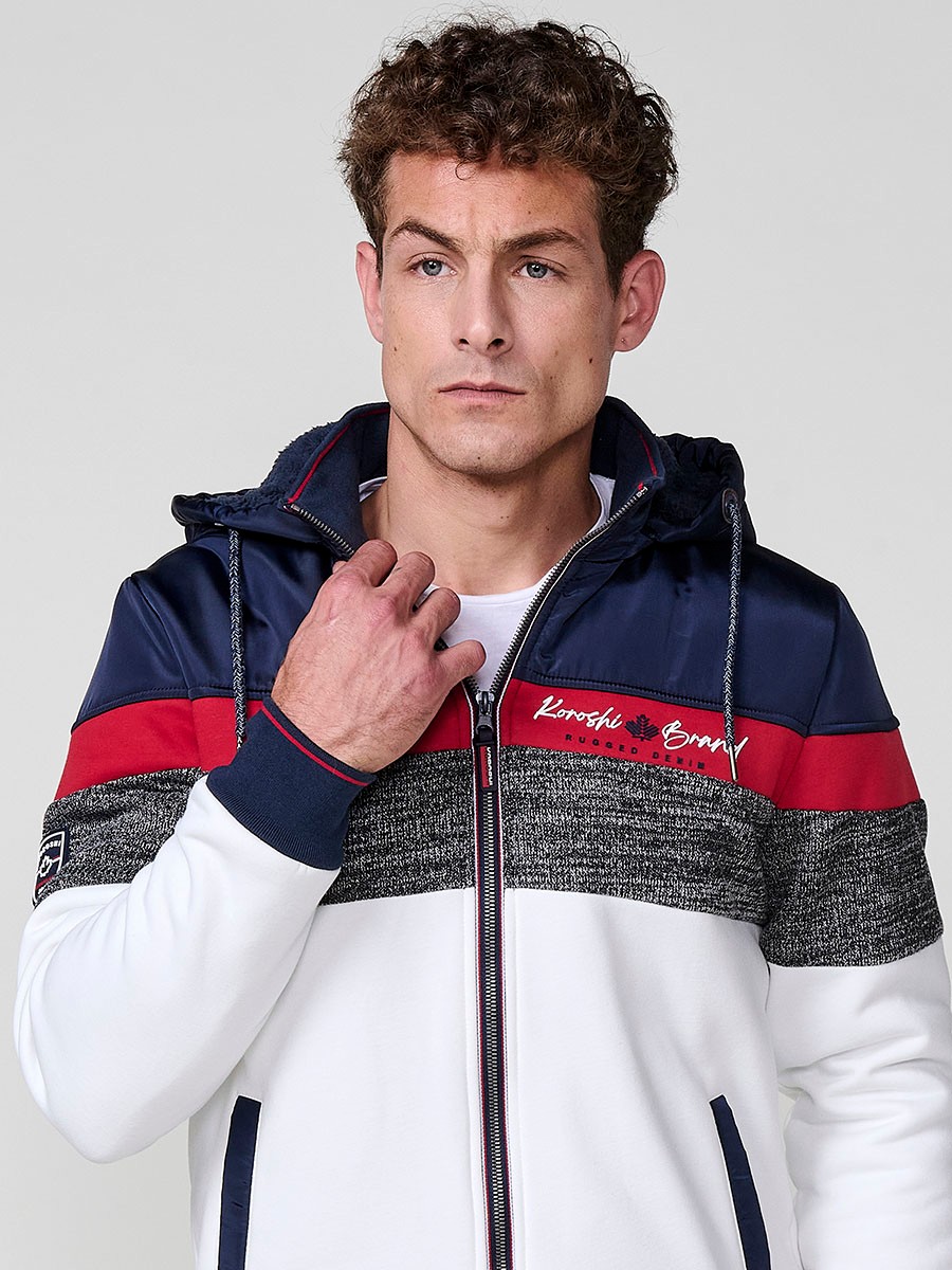 Chaqueta sudadera crudo de hombre con capucha y cierre delantero de cremallera. Confeccionada en 100% poliéster, ligera, resistente y versátil.
