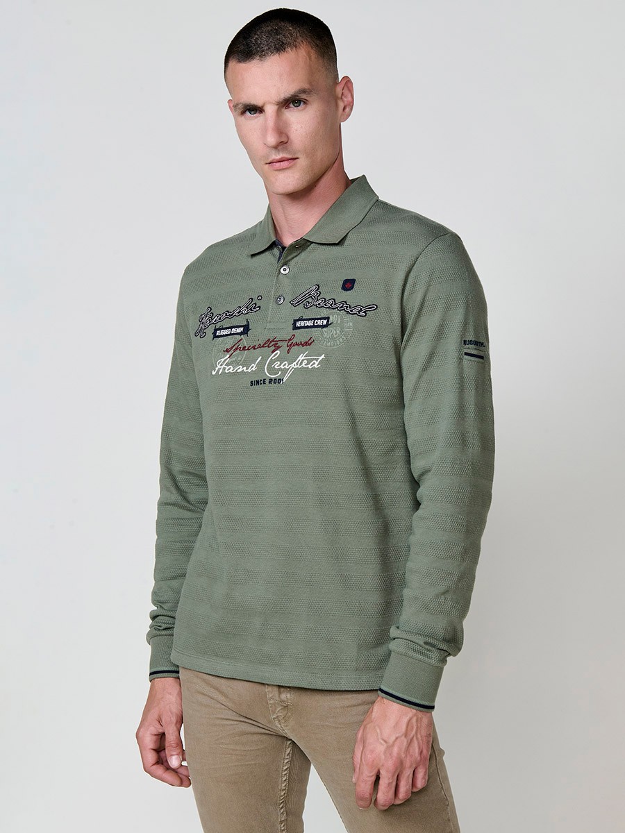 Polo de hombre de manga larga con cuello camisero. Prenda masculina básica de algodón 100%.
