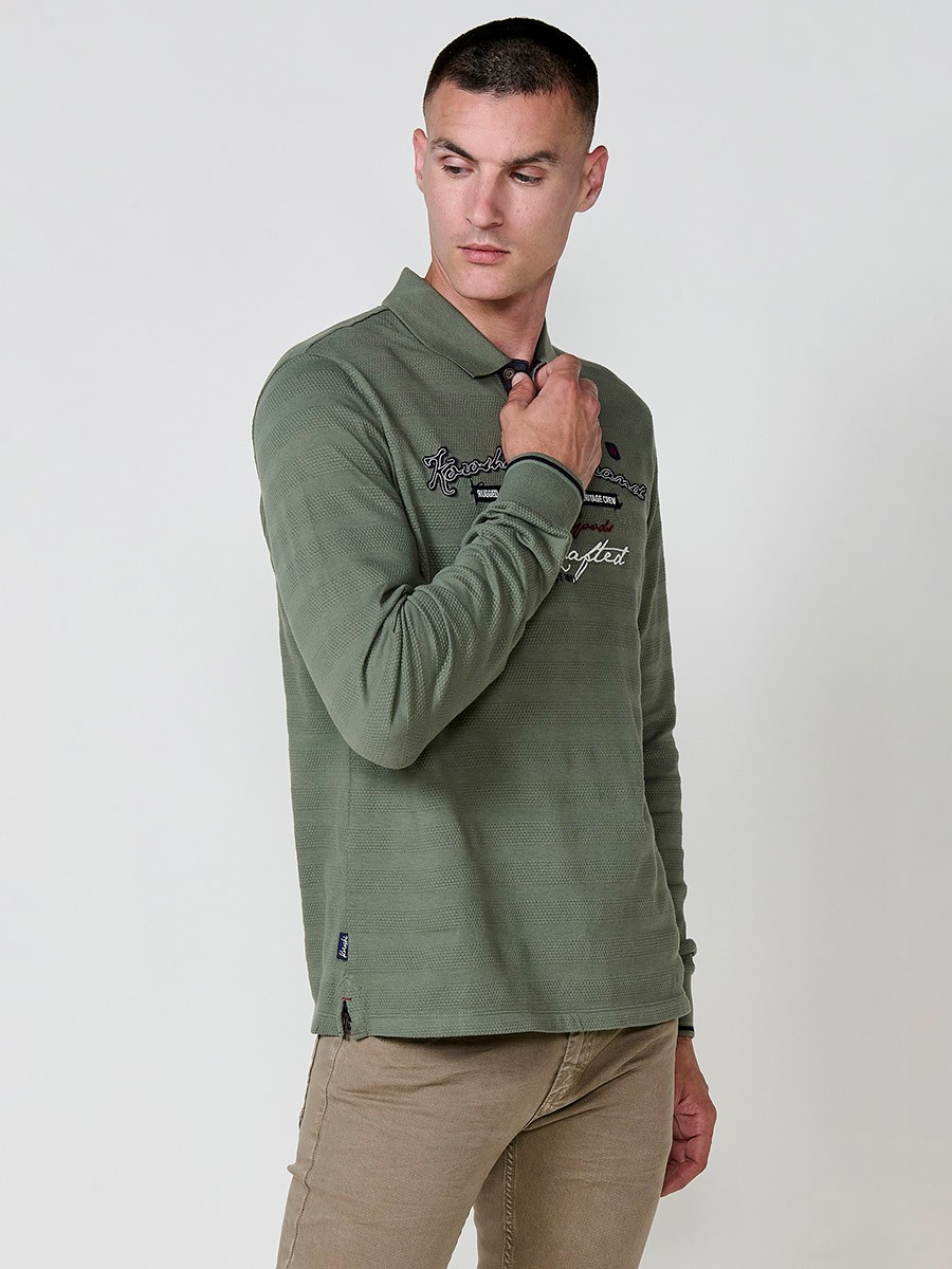Polo de hombre de manga larga con cuello camisero. Prenda masculina básica de algodón 100%.