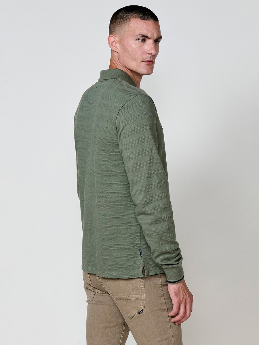 Polo de hombre de manga larga con cuello camisero. Prenda masculina básica de algodón 100%.