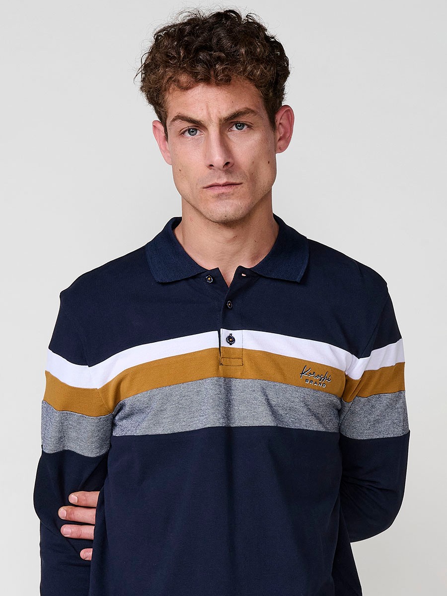 Polo de hombre ocre de manga larga, 100% algodón, con cuello camisero y estilo versátil para looks casuales o elegantes.