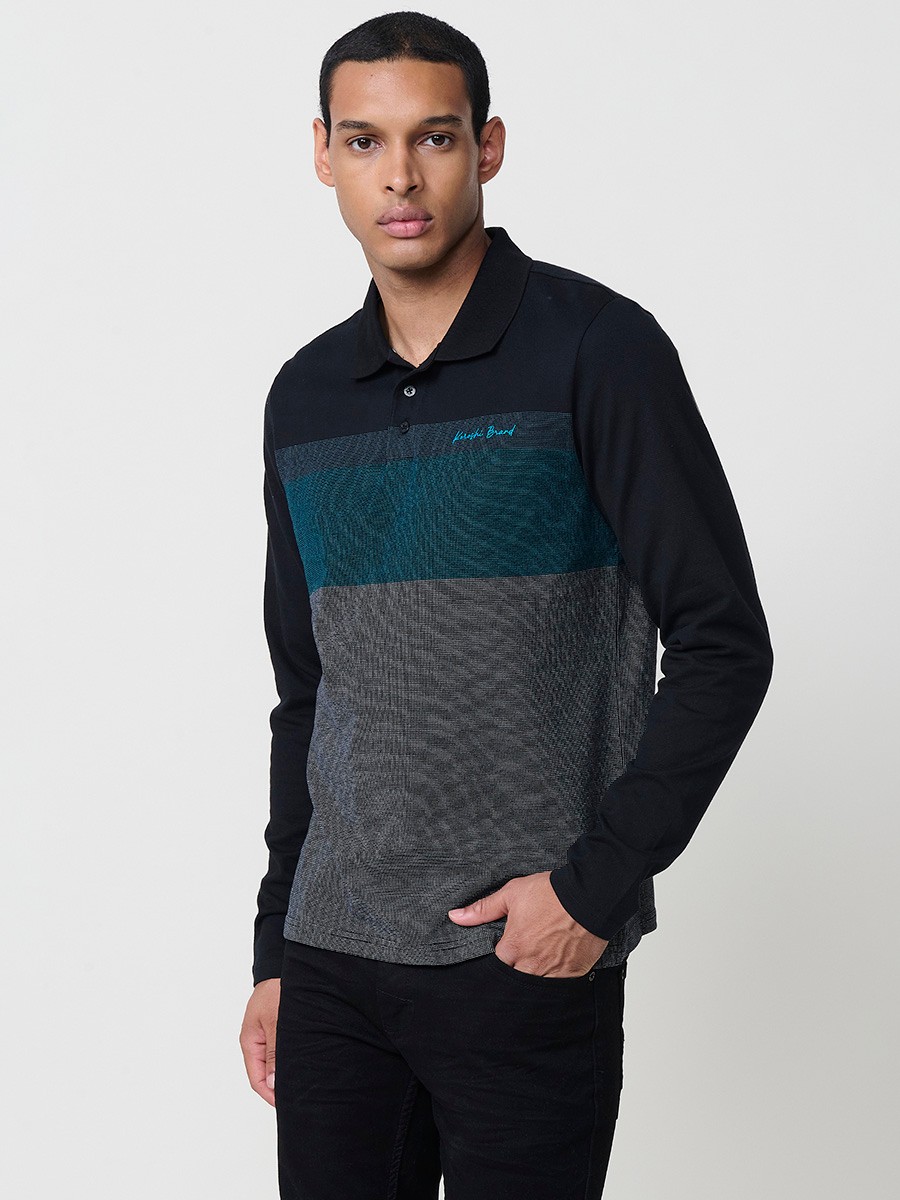 Polo de hombre negro de manga larga con cuello camisero. Prenda masculina básica 100% algodón.