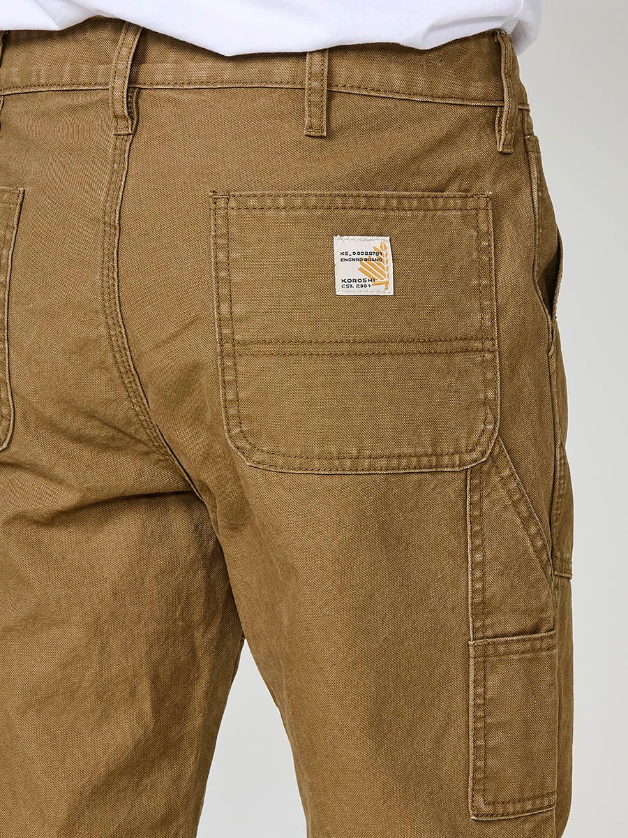 Pantalon cargo long pour homme en beige (tostado), fermeture éclair et bouton. 100 % coton.