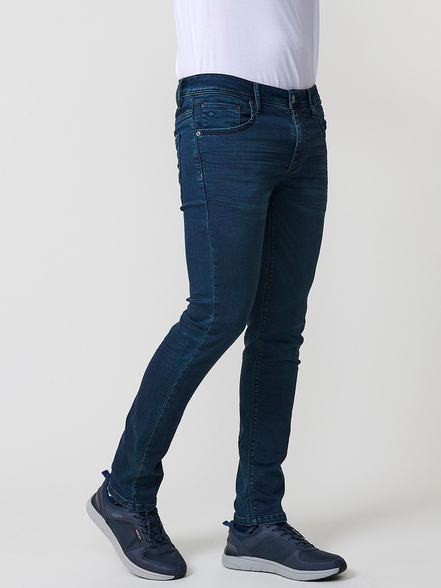 Jean slim fit pour homme avec fermeture éclair et bouton.