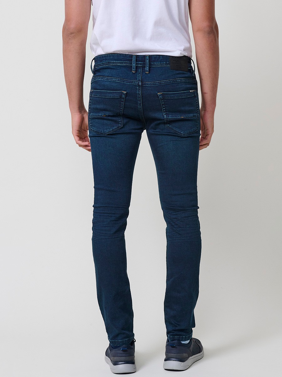 Jean slim fit pour homme avec fermeture éclair et bouton.