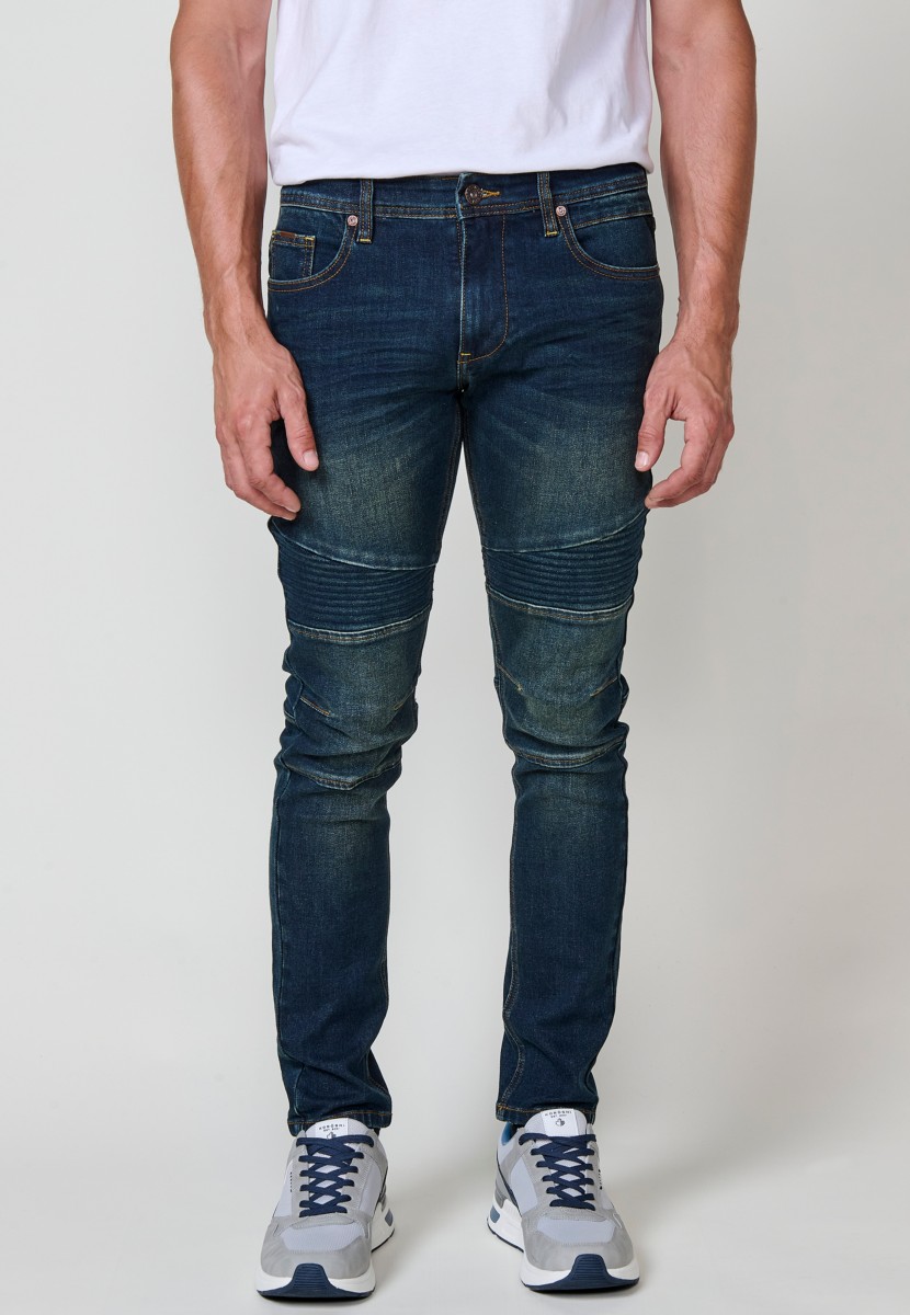 Jean homme Biker Skinny Fit en denim stretch bleu foncé. Coupe ajustée avec détails biker. 98 % coton, 2 % élasthanne.